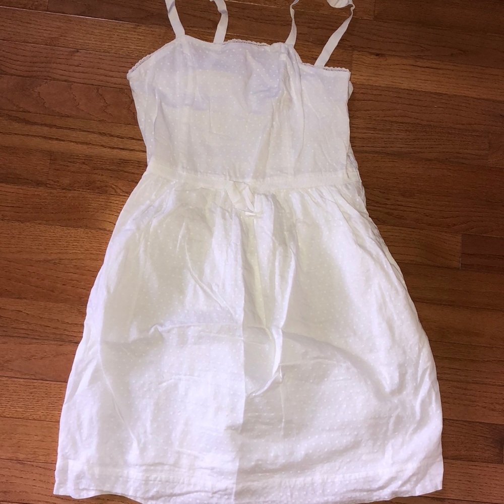 White dress that ends above the knee
